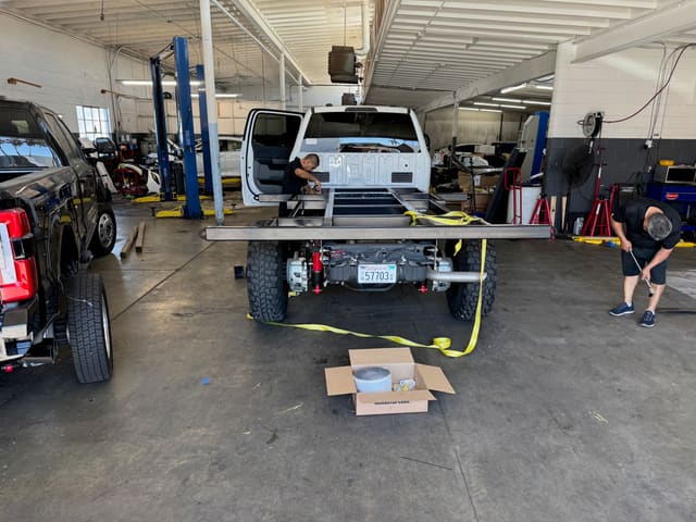 Sub-frame resting on the F-550 chassis during the first test fit